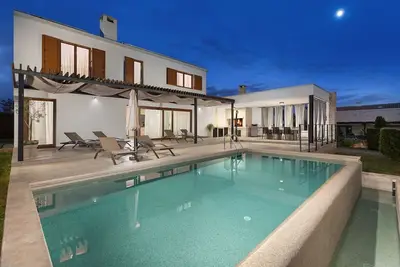 Image de Villa Terra Grigia - belle villa méditerranéenne avec piscine privée a débordement