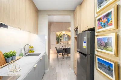 Image de Cozy Tropics in Bgc w/ fast Wifi + Netflix