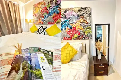 Image de Airport Condo across Naia T3 with king size bed