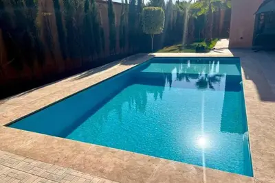 Image de \"Experience luxury in this beautiful Marrakech villa with a heated private