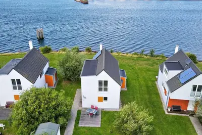 Image de Ferienhaus An der Ostsee by Seeblick Ferien Oro, direkte Wasserlage, Sauna, E-Säule