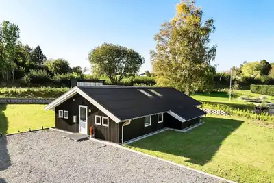 Image de Maison confortable de 5 chambres à.