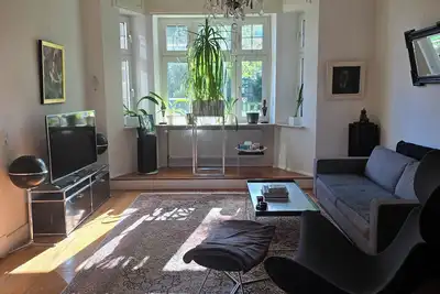 Image de First floor apartment in a sandstone house (villa) with beautiful garden.