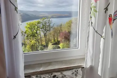Image de Appartement 'Wohnung Reiher Mit 2 Schlafzimmern' avec vue sur le lac et Wi-Fi