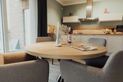 Image de The coastal apartment \"Seeschwalbe\" offers space for up to 5 people.