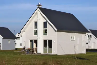 Image de Sanddüne - Infrared sauna, bathtub, shower, fireplace, terrace, grill, parking