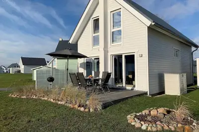 Image de Ostsee Auszeit - Infrared Sauna, Fireplace, Shower, 3 Smart TVs, Terrace, Parking