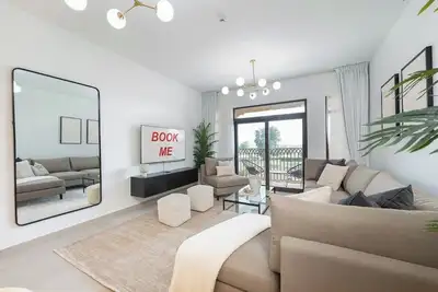 Image de StayShort - Warm and Earthy 1-Bedroom Apartment Perfect for Family in Madinat Ju