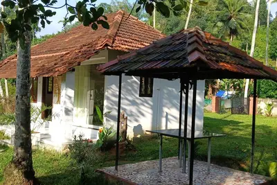 Image de Canan Lake Home – A Serene Riverside Escape in God’s Own Country