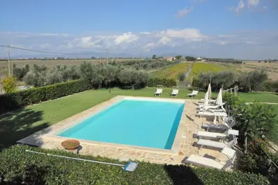 Image de Appartement \"Principina tra mare e natura\" avec piscine partagée, Wi-Fi et climatisation