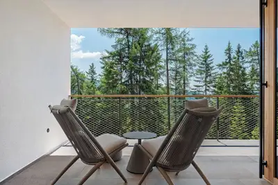 Image de Appartement \"Lodge Pinus Cembra\" avec vue sur les montagnes, terrasse privée et Wi-Fi
