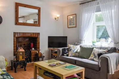 Image de Tawe Cottage is a traditional stone cottage with a homely feel that overlooks the River Tawe.