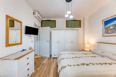 Image de Chambre \"Peonia\" avec terrasse privée et climatisation