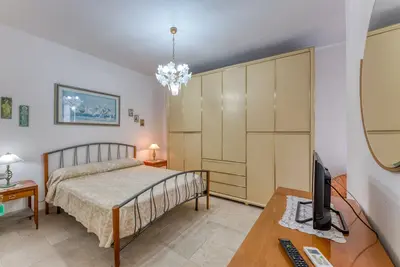 Image de Chambre 'Ortensia' avec terrasse privée et climatisation