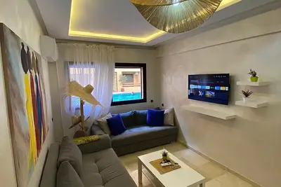 Image de Appartement de luxe vue piscine à côté de la gare de train à Gueliz