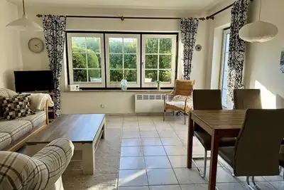 Image de Maison de vacances 'Nordsee Huus' avec terrasse privée, jardin partagé et Wi-Fi