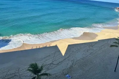 Image de Cozy Beach Condo awaits you with amazing sunsets & ocean breeze