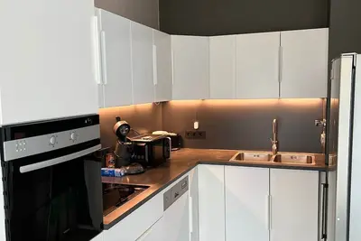 Image de Penthouse CityCenter – Exquisite Living with Netflix & Air Conditioning