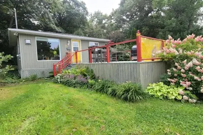 Image de Spa et Vue sur le fleuve | Le Jardin