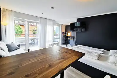 Image de Charming Central Apartment Near Main Station with Netflix – Cozy Yet Spacious