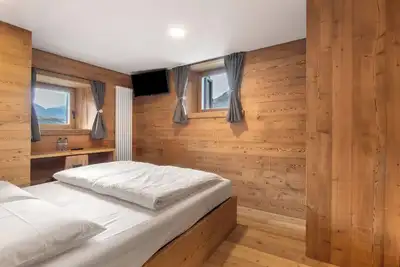 Image de Chambre 'Ferré' avec vue sur le lac, jardin partagé et Wi-Fi