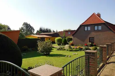 Image de Maison de vacances 'Gemütliches Ferienhaus' avec terrasse et jardin privés