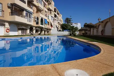 Modern apartment near the beach. WiFi. Swimming pool open all year round