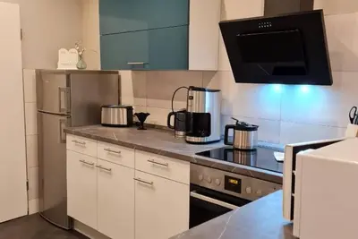 Image de Maison de vacances 'Ferienhaus Küstenperle' avec terrasse privée, jardin partagé et Wi-Fi