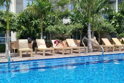 Image de 3-bedroom condo in the heart of Iloilo City with pool, fitness room, WiFi