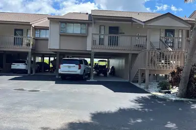 Image de Furnished 2-bedroom condo in Bokeelia with, boat dock, pool, storage unit, etc.