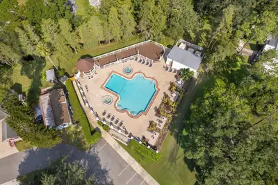 Image de Charming cottage 10 mins to Disney, Pool, Mini Golf, Fitness room and more!