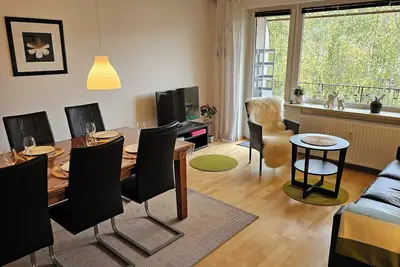 Image de Vacation apartment in a central and quiet location with balcony, within walking distance of the city center