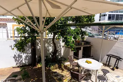 Image de Spacious 5-bedroom apartment to 10 people in fabulous Faro with Ac, WiFi