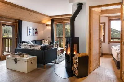Image de Wifi, à 150m des pistes de ski, 3ème étage, vue montagne, sauna, terrasse, cheminée ou poêle à bois