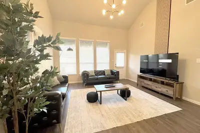 Image de Modern 4br house · 4 king beds · Game room · Community Pool · Pets welcome!