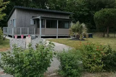 Image de Maison en bois, 15 min bord de mer, idéale famille, piscine, jeux parc sécurisé.