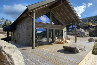 Image de Stylishly furnished chalet with a large terrace in VrĂĄdal
