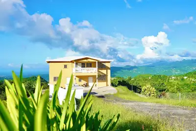 Cottage with Ocean, City and Rainforest Views