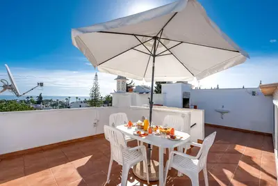 Image de Appartement 'Casa Oliveira - Algarve' avec vue sur mer, Wi-Fi et climatisation