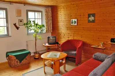 Image de Maison de vacances 'Zum Grünen Hirsch Stolln' avec vue sur la montagne, terrasse privée et Wi-Fi