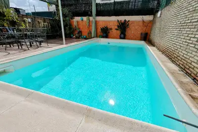 Image de Next to the Metro and the center of Seville! Large house with private pool.