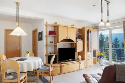 Image de Appartement 'Ferienwohnung Tannenblick 7-4' avec vue sur la montagne, jardin partagé et Wi-Fi