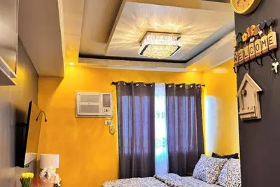 Image de Cozy 1-bedroom condo with Ac, WiFi in serene Silang Kitchen mini karaoke.