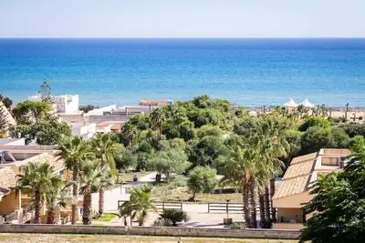 Image de Appartement à Triscina au bord de la mer avec piscines