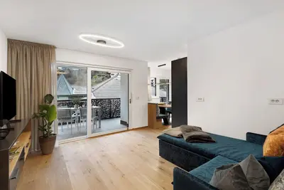 Image de Appartement 'Paradeis Apartments A18' avec vue sur les montagnes, terrasse privée et Wi-Fi