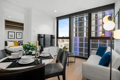 Image de Stunning 2br Apartment in Melb Cbd w/ Pool and Gym