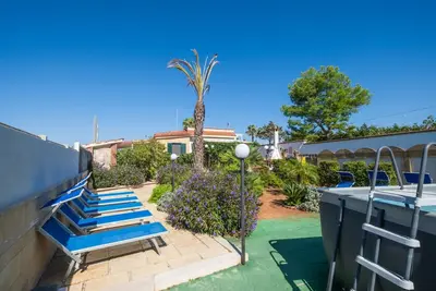 Appartement Sirena dans une villa de luxe avec piscine partagée