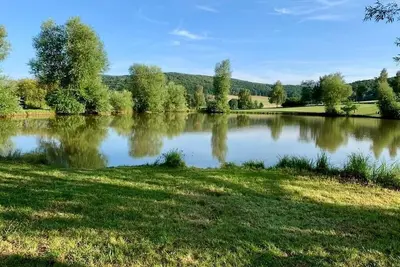 Image de The red house by the lake - vacation home in a fantastic location