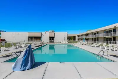 Experience Relaxation with Pool and Free On-Site Parking | 4 Affordable Rooms