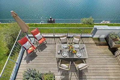 Image de Durchblick - Waterfront Apartment, 2 Bathrooms, Whirlpool, Shower, Sauna, Firepl